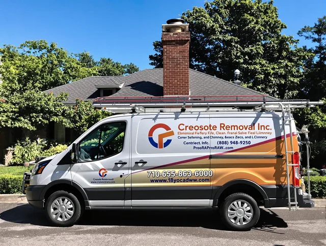 Rockland Chimney Sweep technician removing creosote safely in Rockland, MA