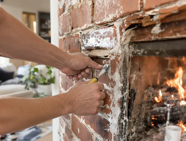 Routine fireplace repair by Rockland Chimney Sweep in Rockland, MA